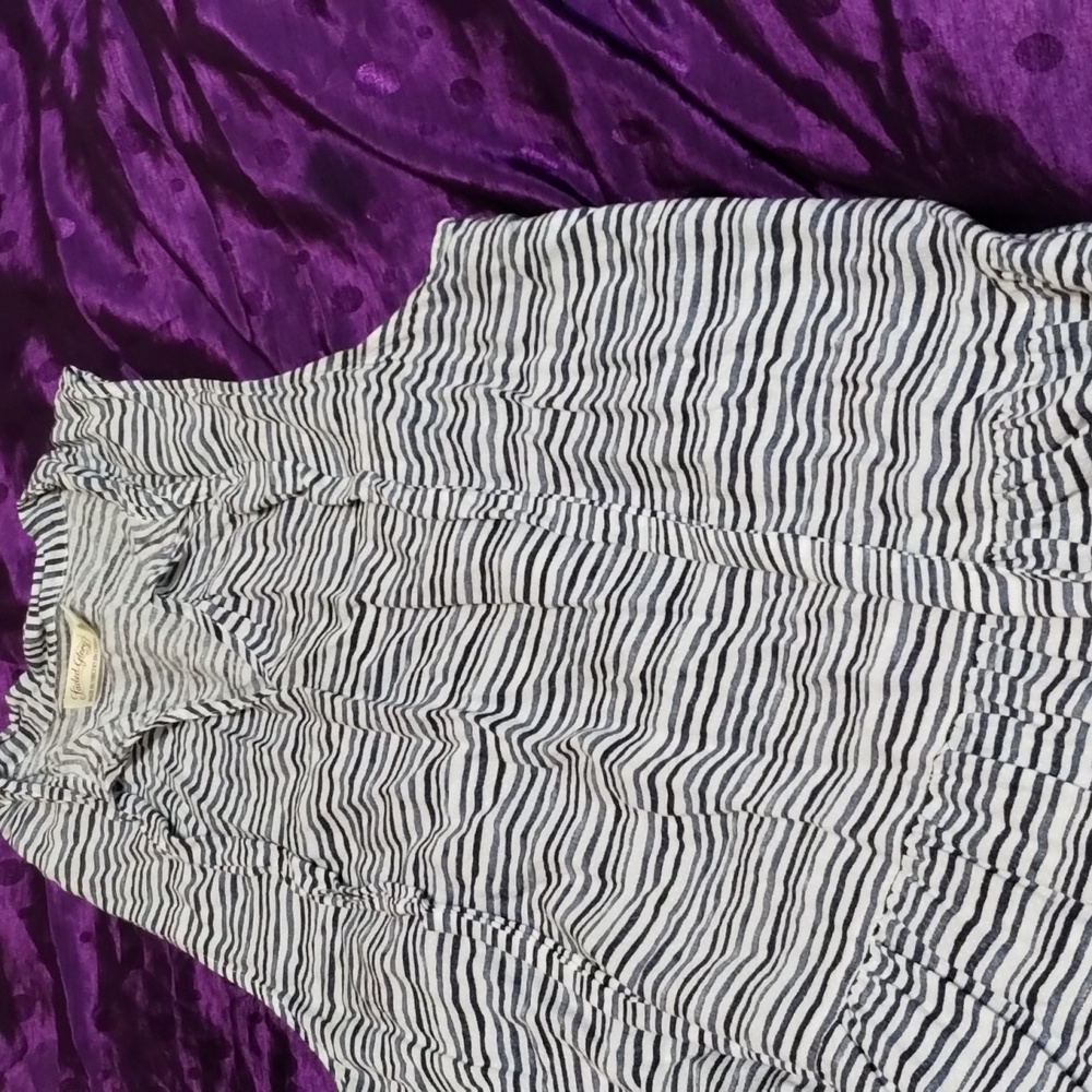 Striped blue and white sleeveless shirt